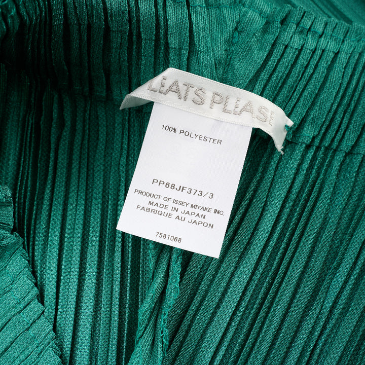 Pleats Please Issey Miyake Thicker Bottoms Pleated Pants in emerald green, displayed flat to show voluminous diagonal-pleated harem silhouette tapering at the ankle - view 3