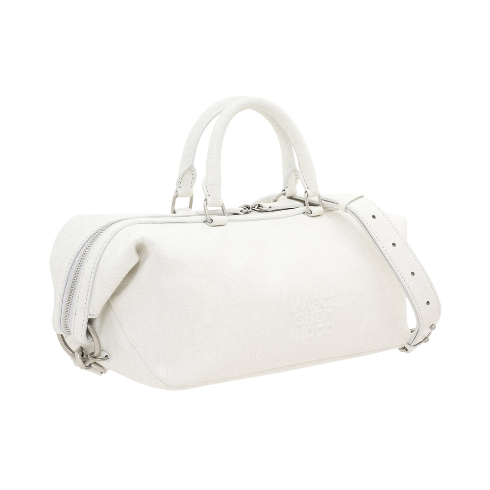 Marge Sherwood Dumpling East West Tote in white textured leather with dual top handles, adjustable shoulder strap, zip closure, and tonal embossed logo - view 2