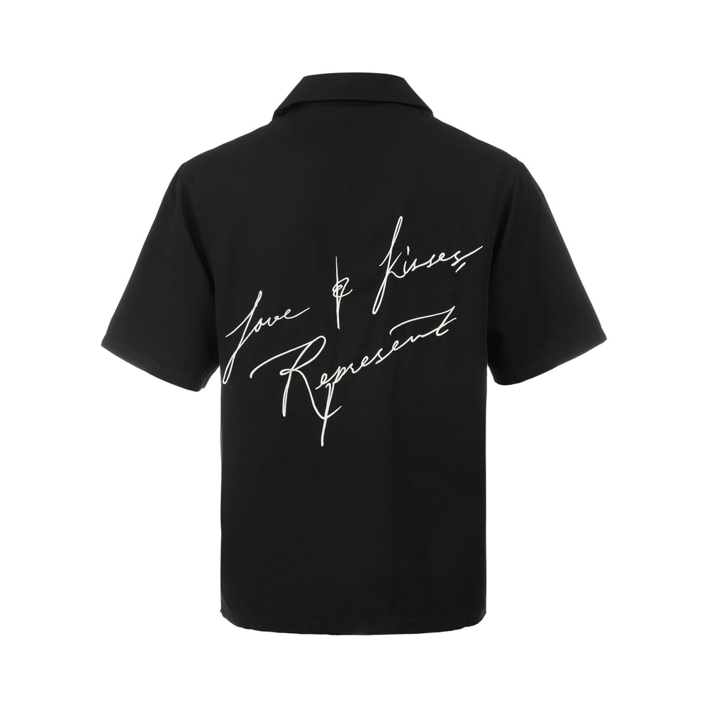 Represent Love and Kisses Short Sleeve Resort Shirt in black with Cuban collar, dual chest pockets, and cursive script logo embroidery - view 2