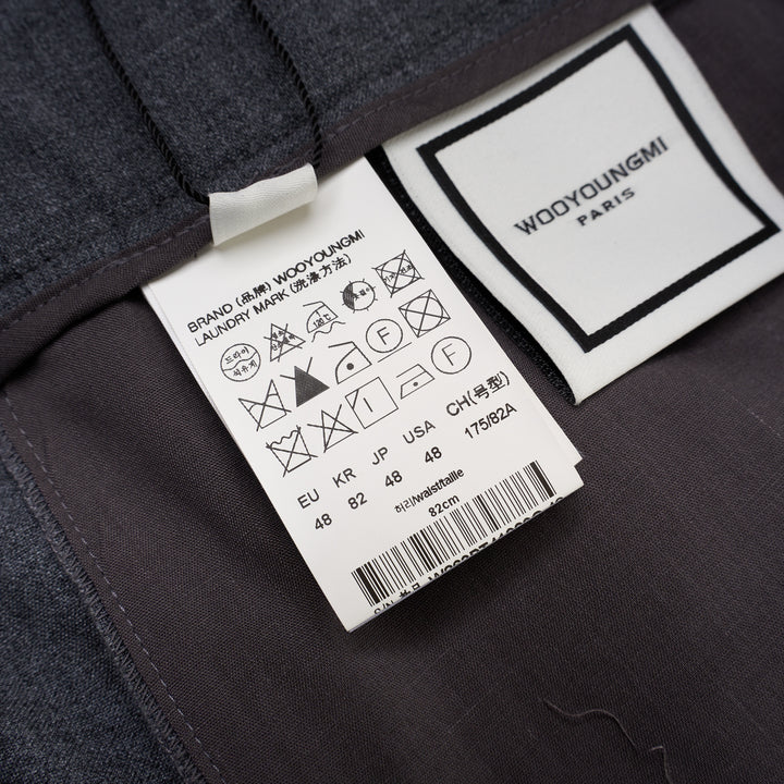 Wooyoungmi Elastic Waist Slim Pants in grey mélange fabric with ribbed knit cuffs and metal hardware detail at the waistband, front view - view 3