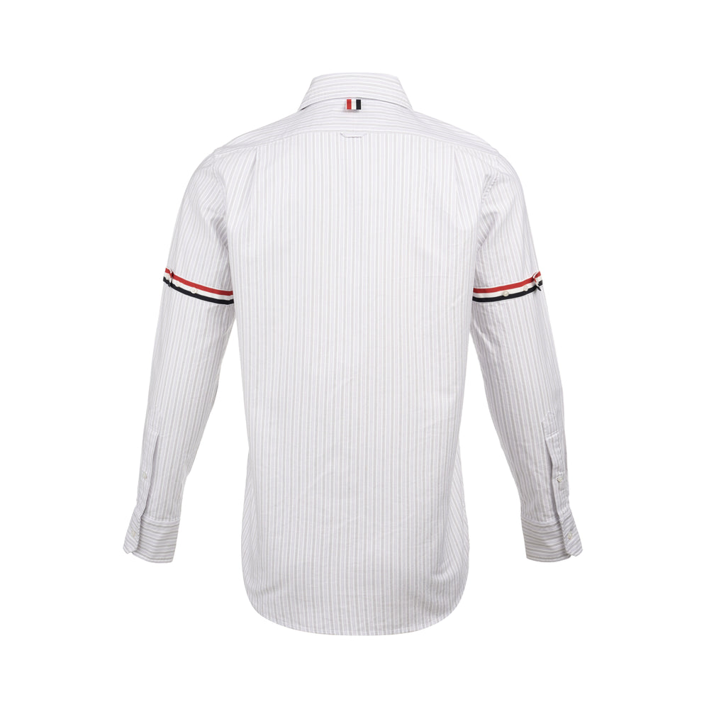 Thom Browne Straight Fit Long Sleeve Shirt in white and grey pinstripe cotton, featuring the house's red, white, and blue grosgrain stripe on the sleeve and a woven label at the hem - view 2