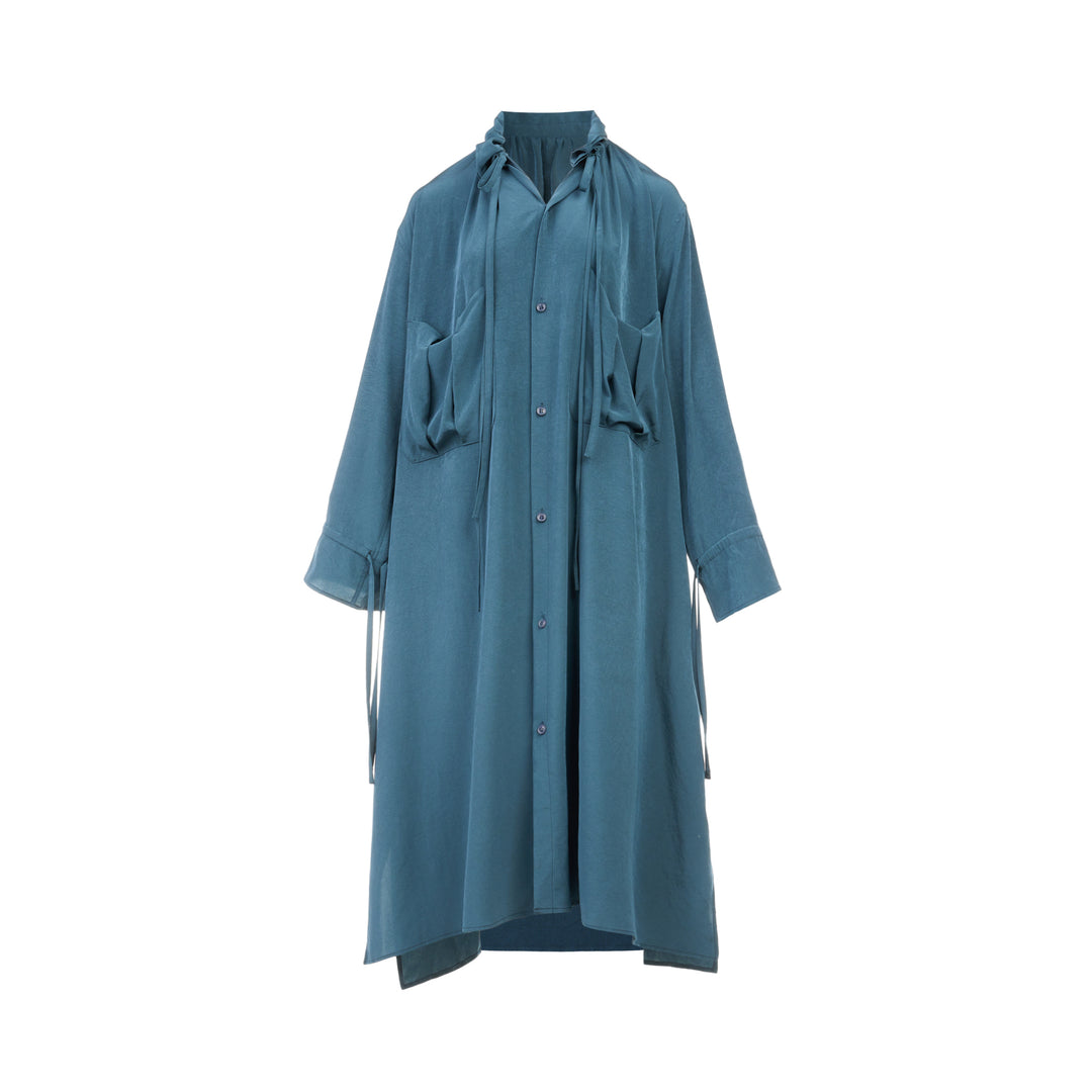 Y's teal blue gather collar shirt dress with tie neck, button front fastening, oversized patch pockets, and ribbon cuff ties, displayed flat on white background