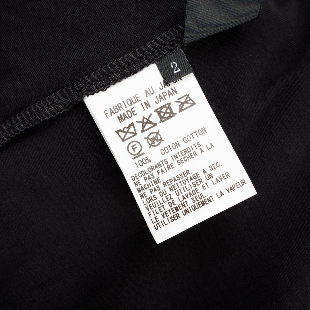 Y's Lace-Up String Flare Skirt in black, featuring elasticated waistband with ribbon tie, ruched drawstring knots, fluid drape, and asymmetric midi hem - view 3