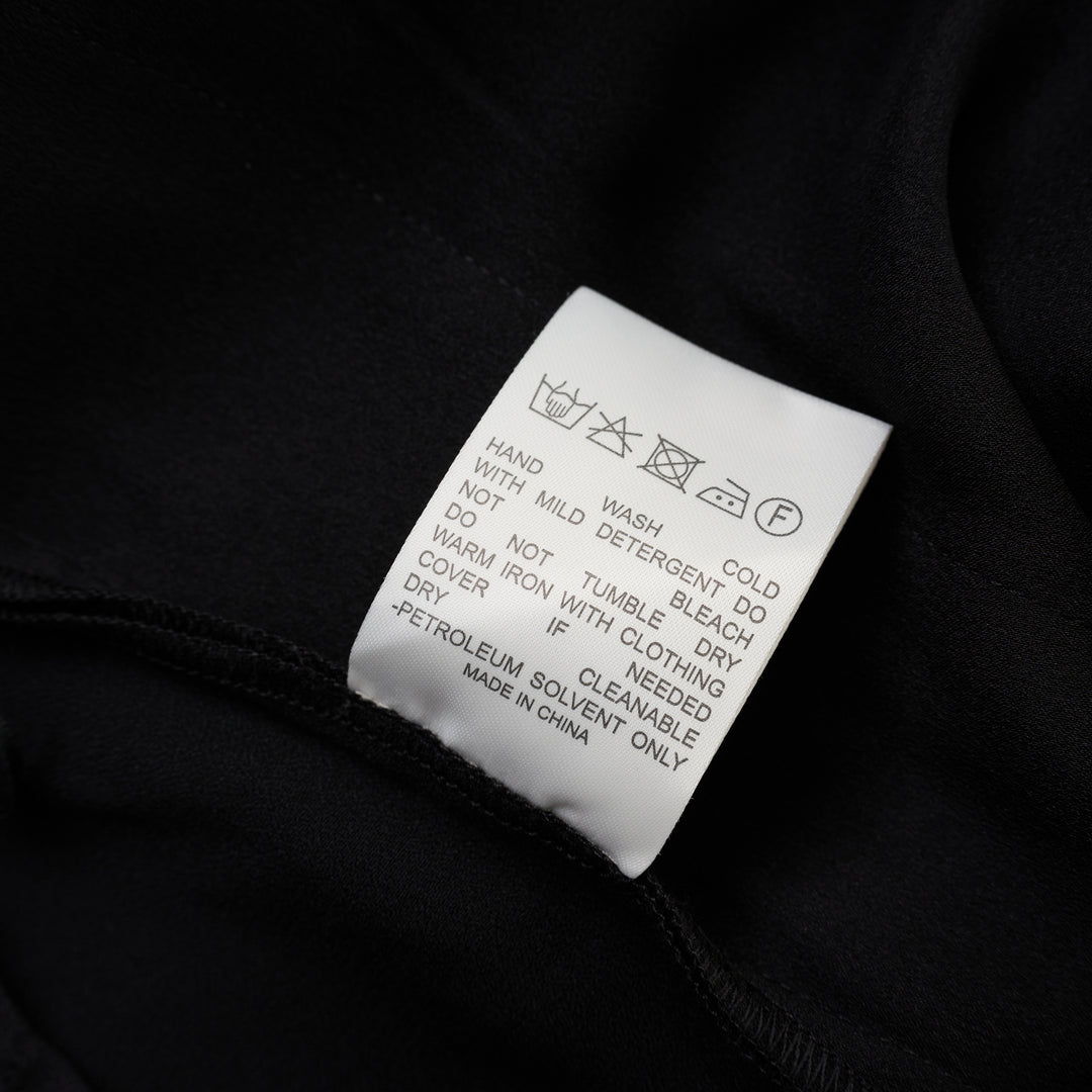 Black wide-leg crepe acetate trousers with a front pleat and single-button waist, shown from the front - view 4