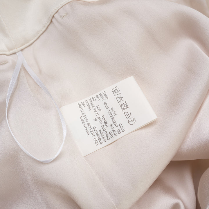 Cream wide-leg high-rise cargo pants in crepe acetate blend with flap pockets and pressed front crease - view 3