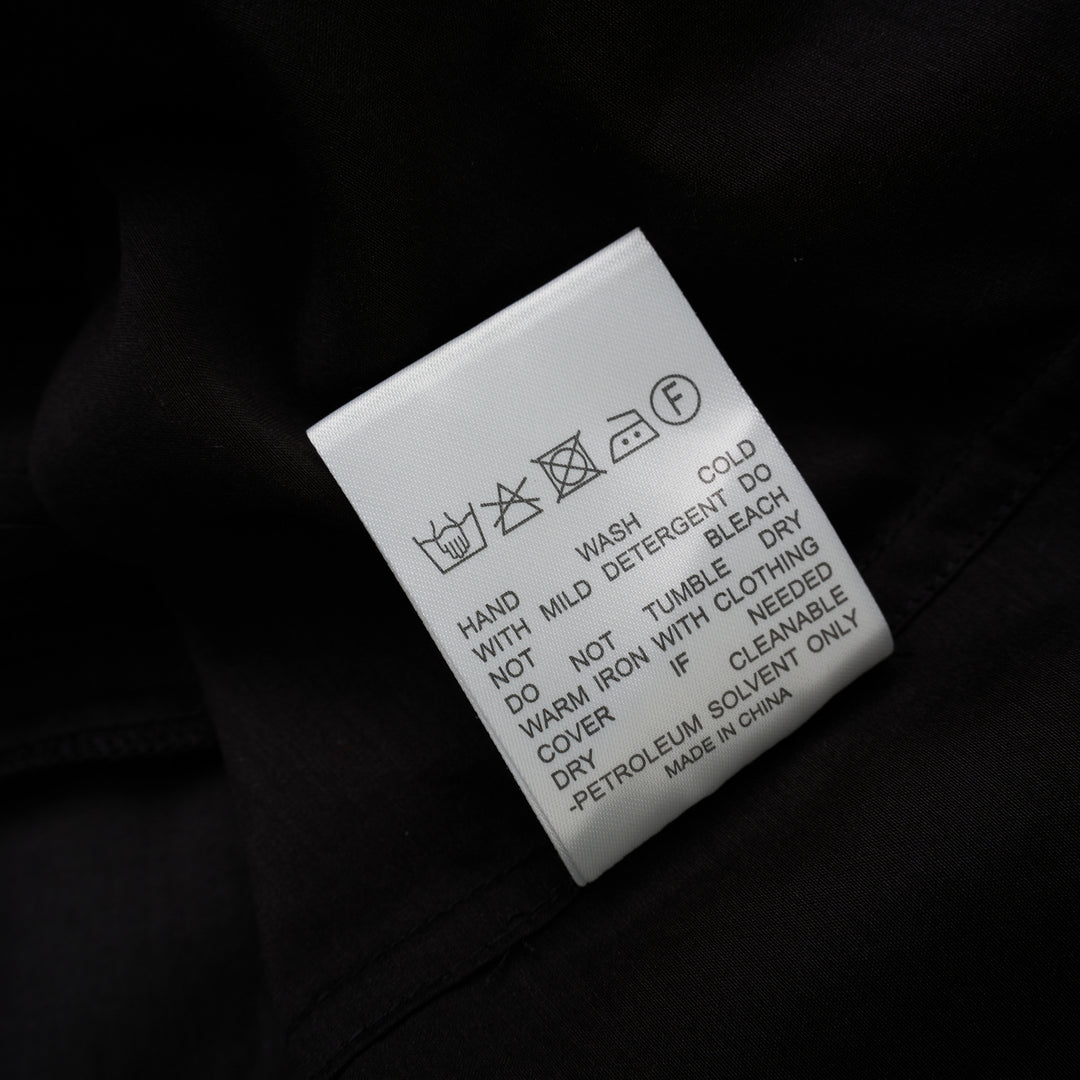 Black sheer silk-cotton Soline shirt with pleated tuxedo-style bib, pointed collar, concealed placket and long sleeves - view 4