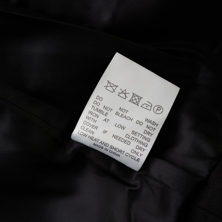 Black cropped blazer with oversized notched lapels, open front and flap pockets in a crinkled steel wire cotton-rayon fabric - view 4