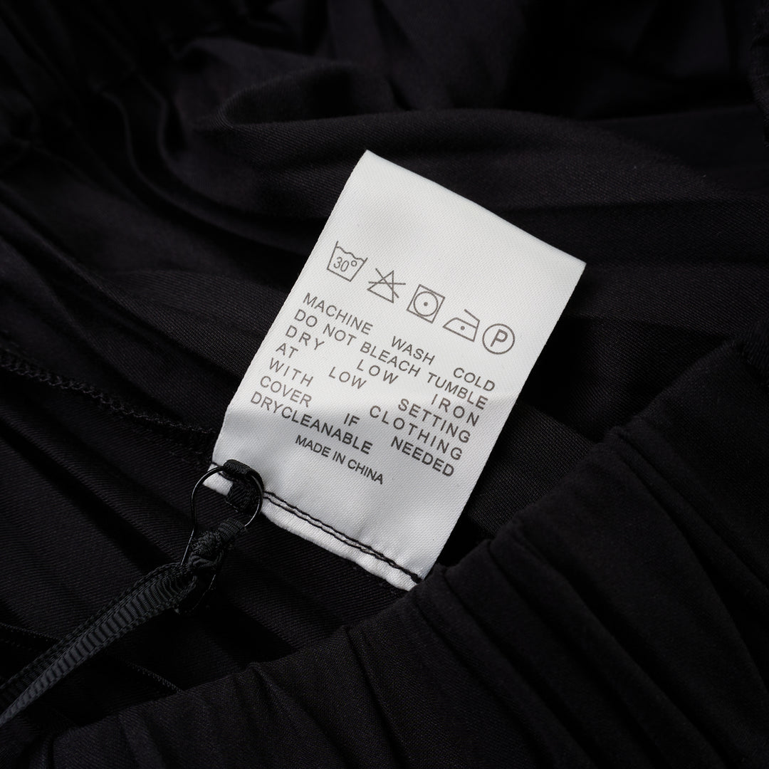 Black pleated midi skirt with elasticated waist and asymmetric handkerchief hem by Club21 Collection - view 3