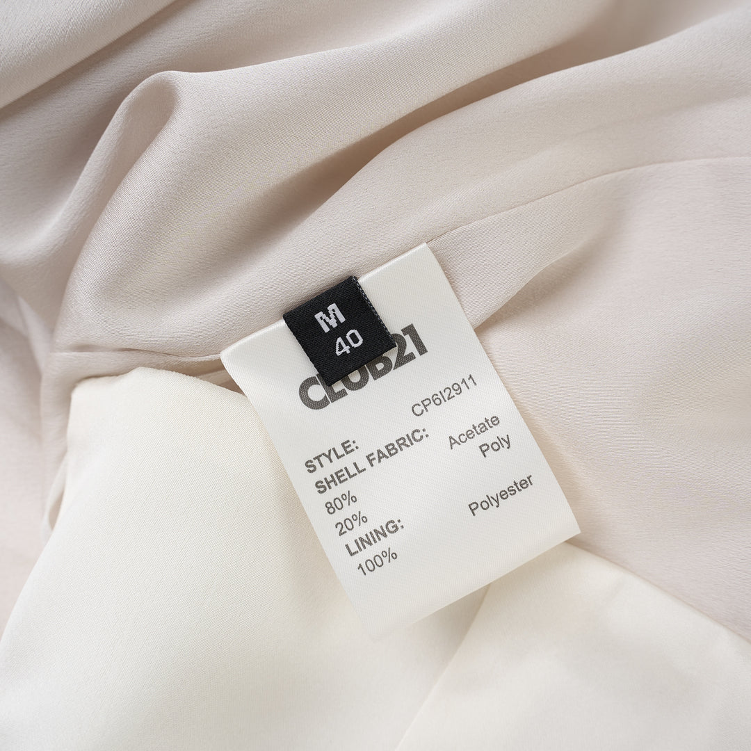 Ivory matte acetate mix maxi skirt with diagonal seam and flared hem, shown from the front - view 3