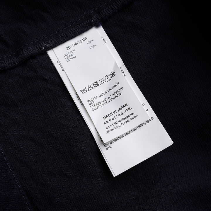 sacai indigo denim blazer jacket with notched lapels, contrast golden topstitching, flap chest pockets and gold anchor buttons - view 3