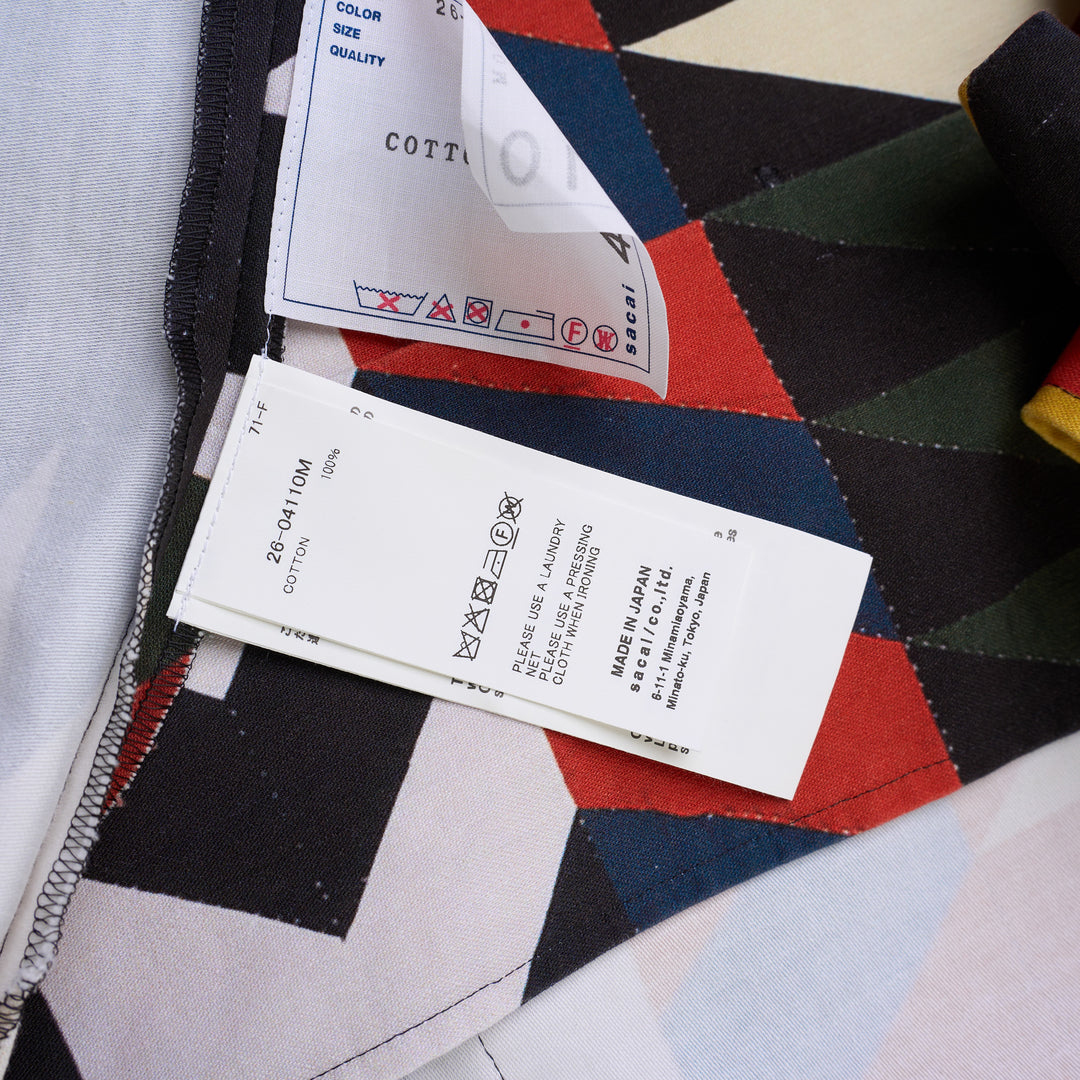 sacai x A.P.C. Quilts short sleeve shirt with a multicolour geometric arrow print, camp collar, button front and two flap chest pockets - view 3