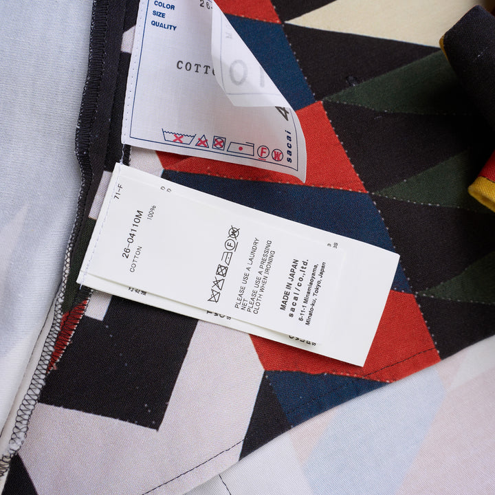 sacai x A.P.C. Quilts short sleeve shirt with a multicolour geometric arrow print, camp collar, button front and two flap chest pockets - view 3