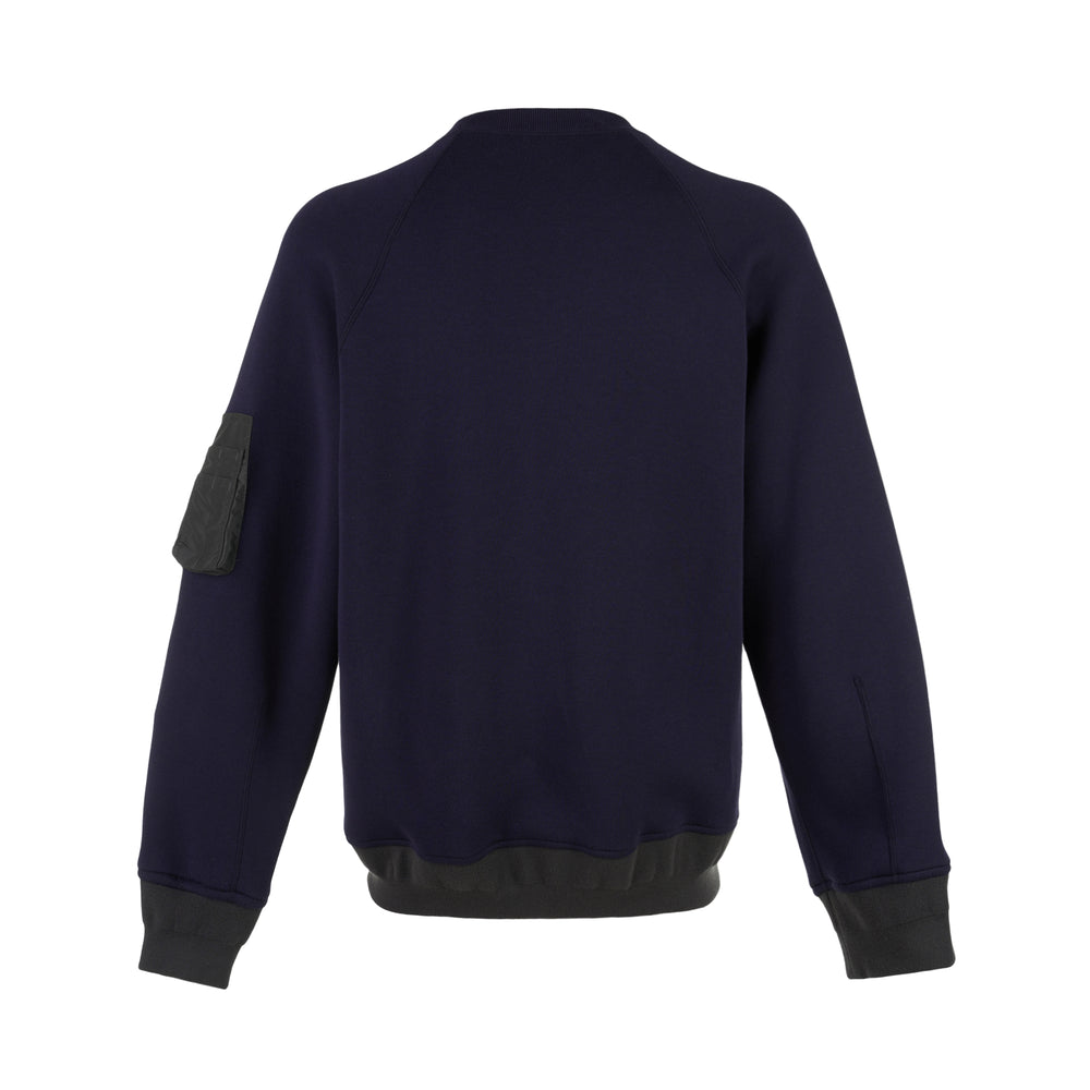sacai Sponge Sweat Blouson in navy with asymmetric diagonal zip, contrast dark ribbed hem and cuffs, chest snap tabs and off-white sleeve zip pocket - view 2