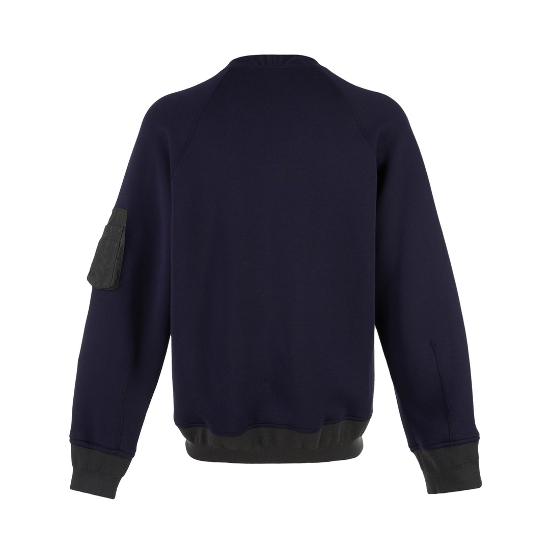 sacai Sponge Sweat Blouson in navy with asymmetric diagonal zip, contrast dark ribbed hem and cuffs, chest snap tabs and off-white sleeve zip pocket - view 2