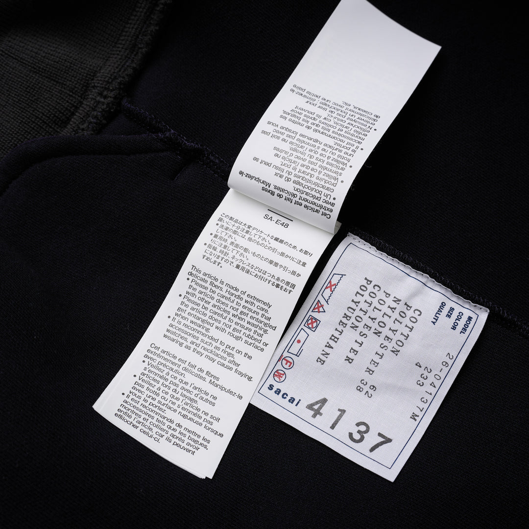 sacai Sponge Sweat Blouson in navy with asymmetric diagonal zip, contrast dark ribbed hem and cuffs, chest snap tabs and off-white sleeve zip pocket - view 6