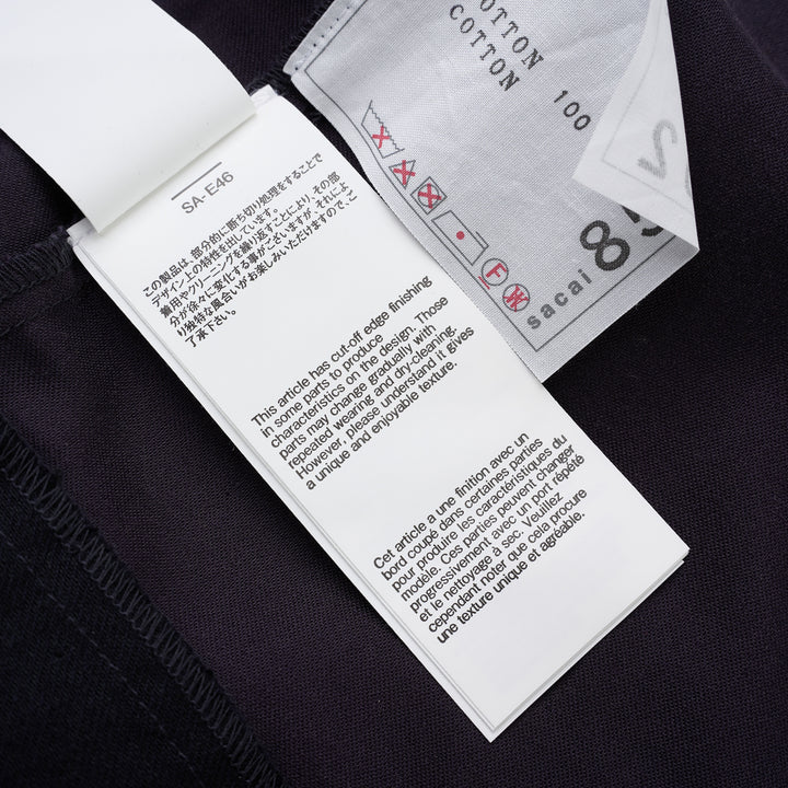 sacai belted peplum denim midi skirt in dark indigo with contrast topstitching, shown from the front - view 5