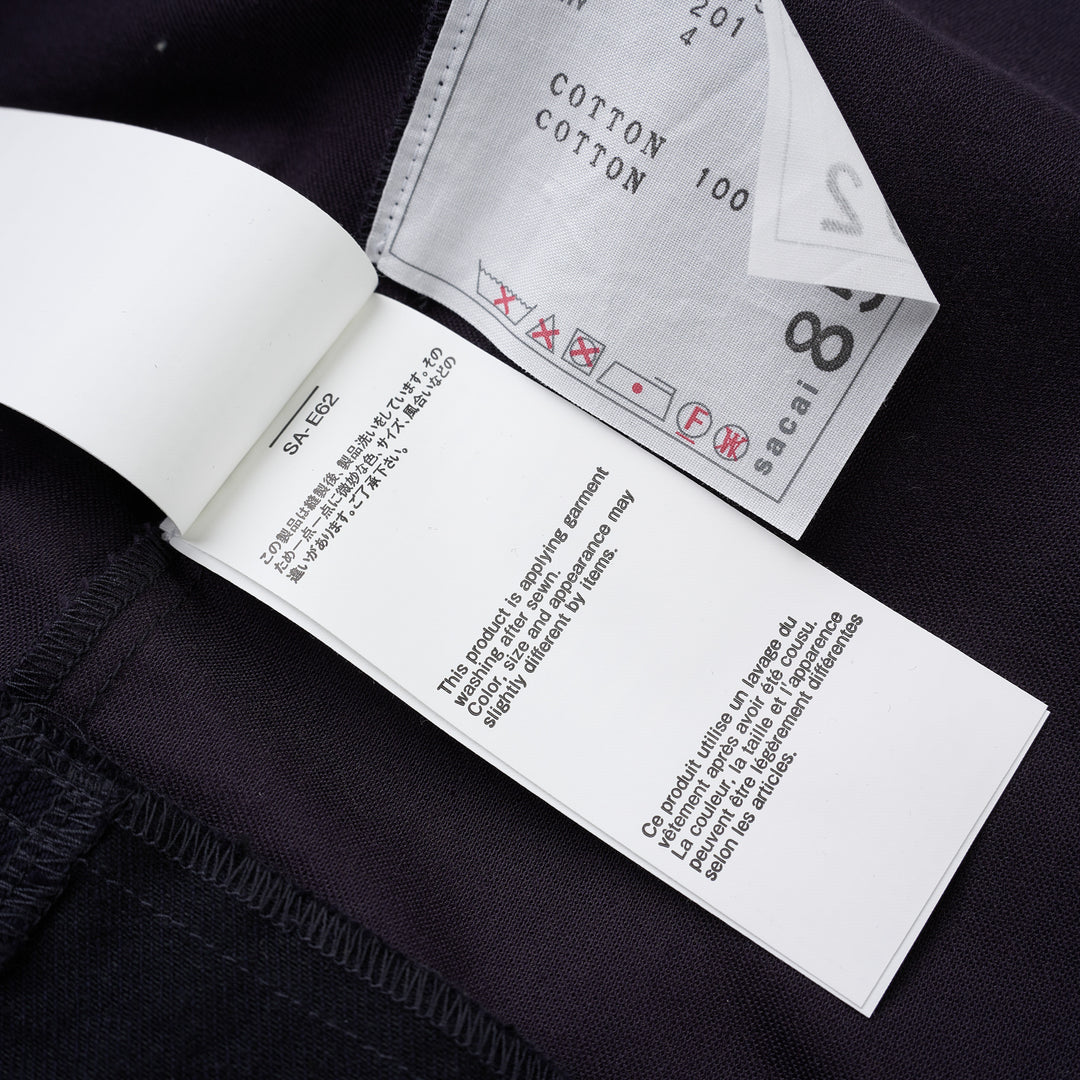 sacai belted peplum denim midi skirt in dark indigo with contrast topstitching, shown from the front - view 7