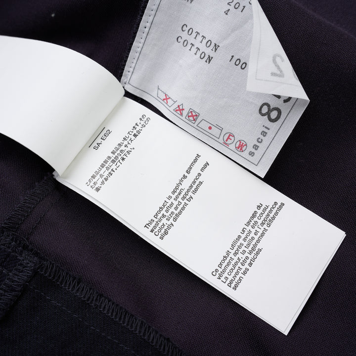 sacai belted peplum denim midi skirt in dark indigo with contrast topstitching, shown from the front - view 7