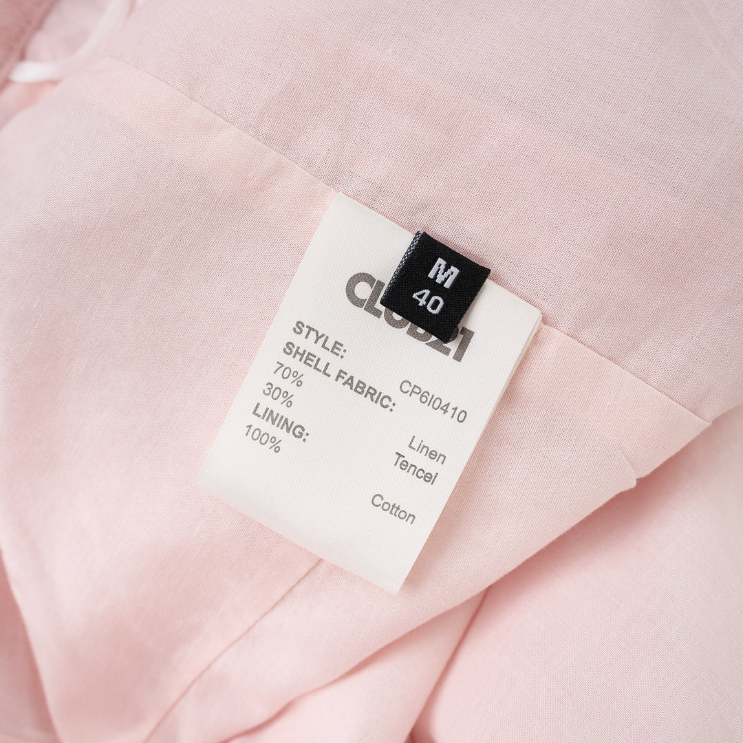 Pink hand-brushed linen wide-leg trousers with high waist and front patch pockets, shown flat on a white background - view 3
