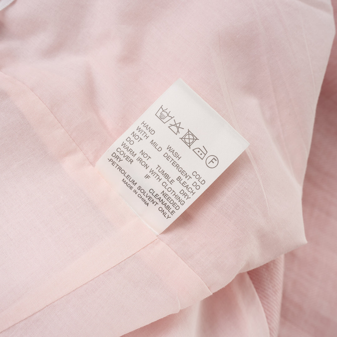 Pink hand-brushed linen wide-leg trousers with high waist and front patch pockets, shown flat on a white background - view 4