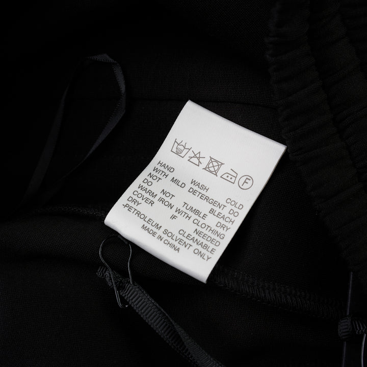 Black wide-leg Lena pants in high-stretch modal jersey with an elasticated drawstring waistband, shown from the front - view 3