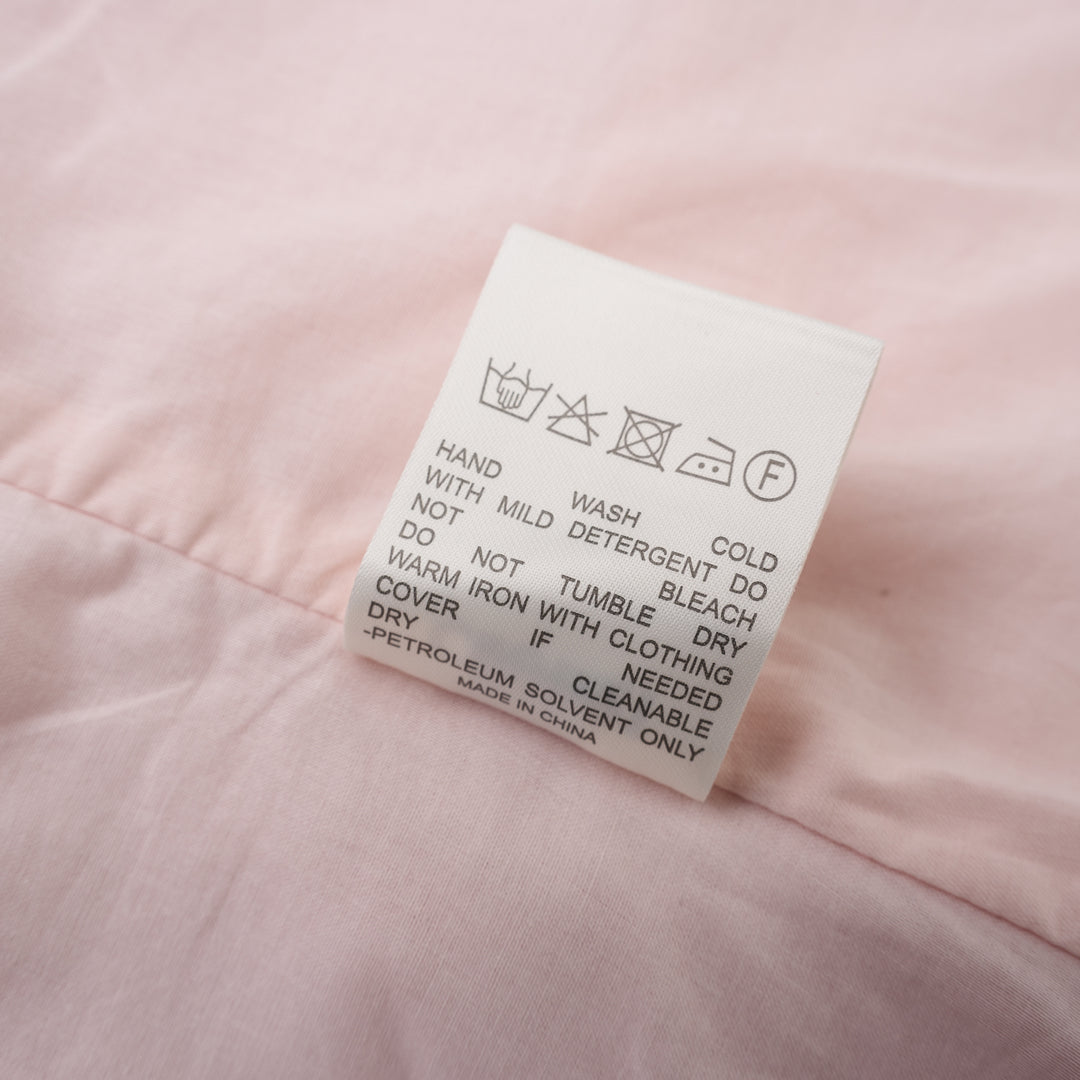 Pink hand-brushed linen Tencel halter vest with crossover neckline, back tie, button front and welt pockets - view 4