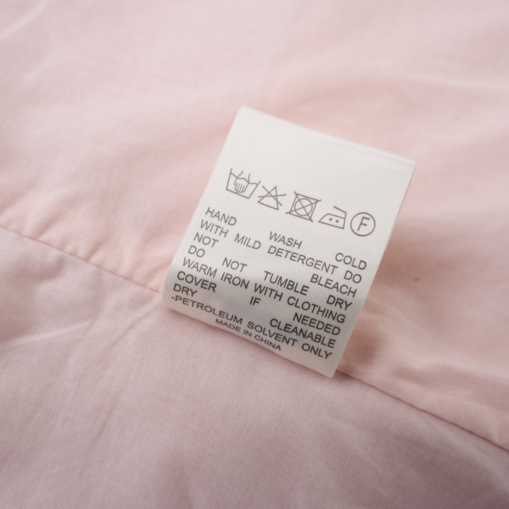 Pink hand-brushed linen Tencel halter vest with crossover neckline, back tie, button front and welt pockets - view 4