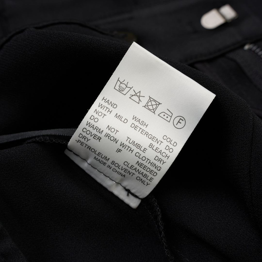 Black wide-leg cargo pants in crepe acetate mix with flap side pockets and panelled front, shown from the front - view 4