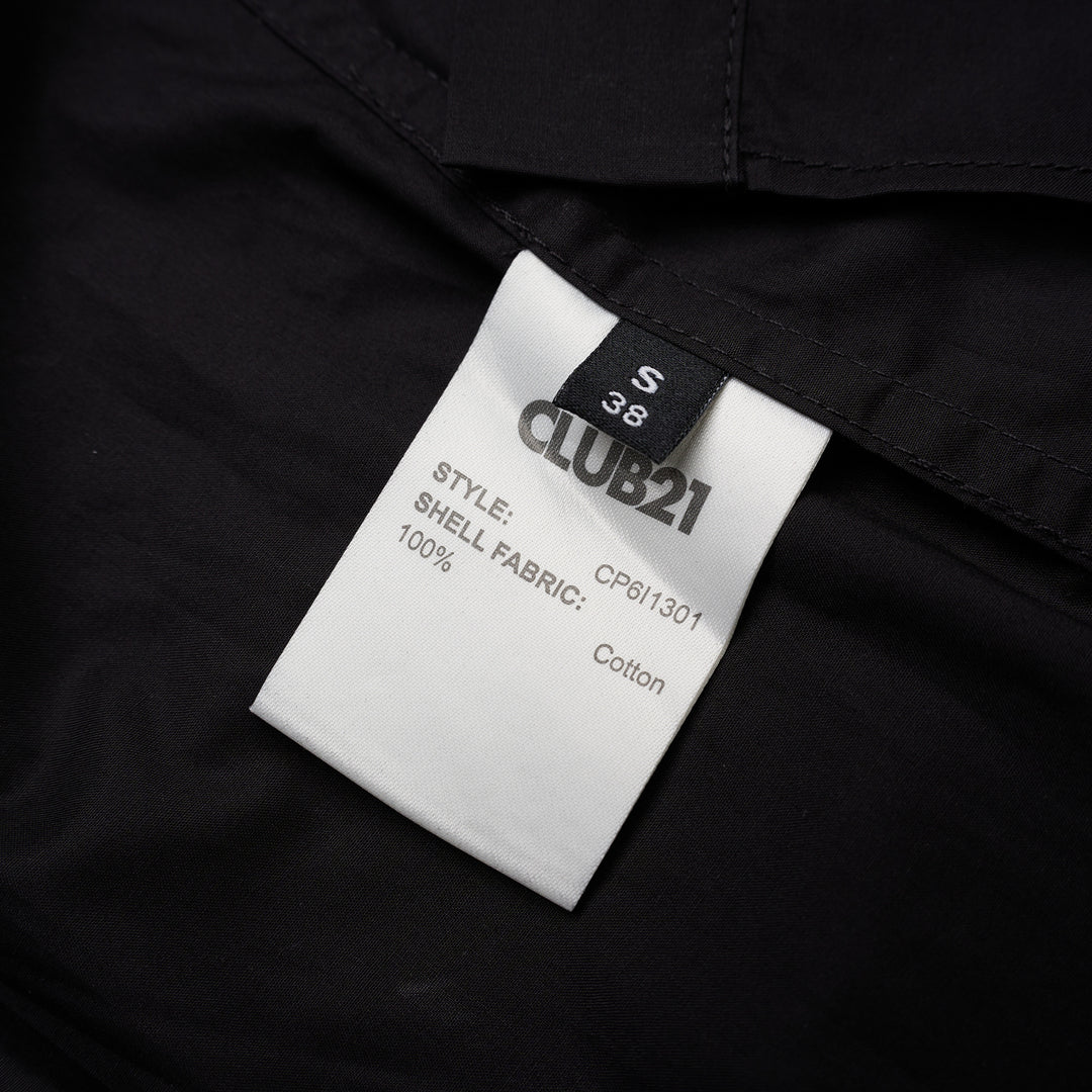 Black sleeveless cotton shirt with mandarin collar, pleated bib front and self-tie waist belt - view 3