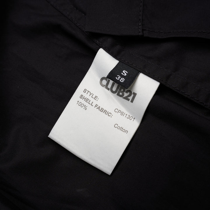 Black sleeveless cotton shirt with mandarin collar, pleated bib front and self-tie waist belt - view 3