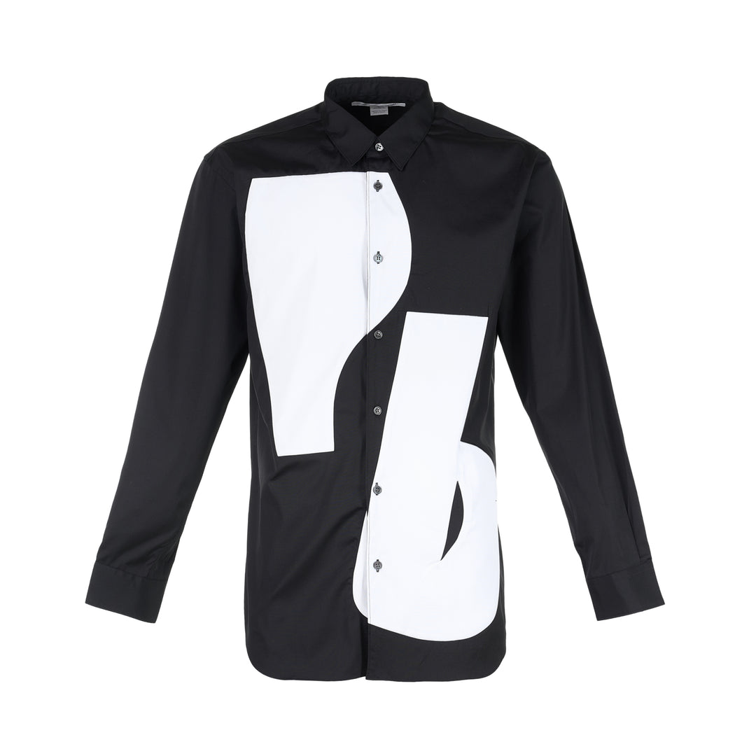 Comme des Garçons Shirt black long sleeve button-up shirt with curved white patchwork panels on the front