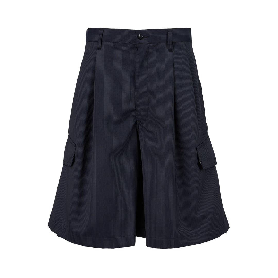 Navy pinstripe pleated cargo shorts by Comme des Garçons Shirt with a wide-leg cut, flap pockets and button fly, shown from the front