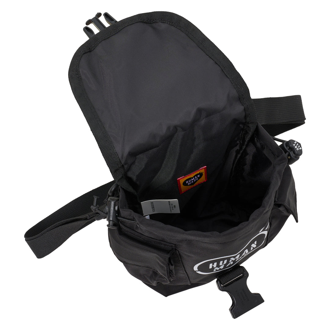 Human Made Military Pouch #1 in black with front buckle flap, webbing straps, DRY ALLS stencil label and side pockets - view 4