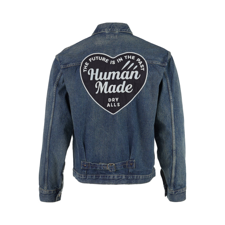 Human Made washed indigo denim work jacket with pleated front, button closure and heart-shaped logo patch on the chest - view 2