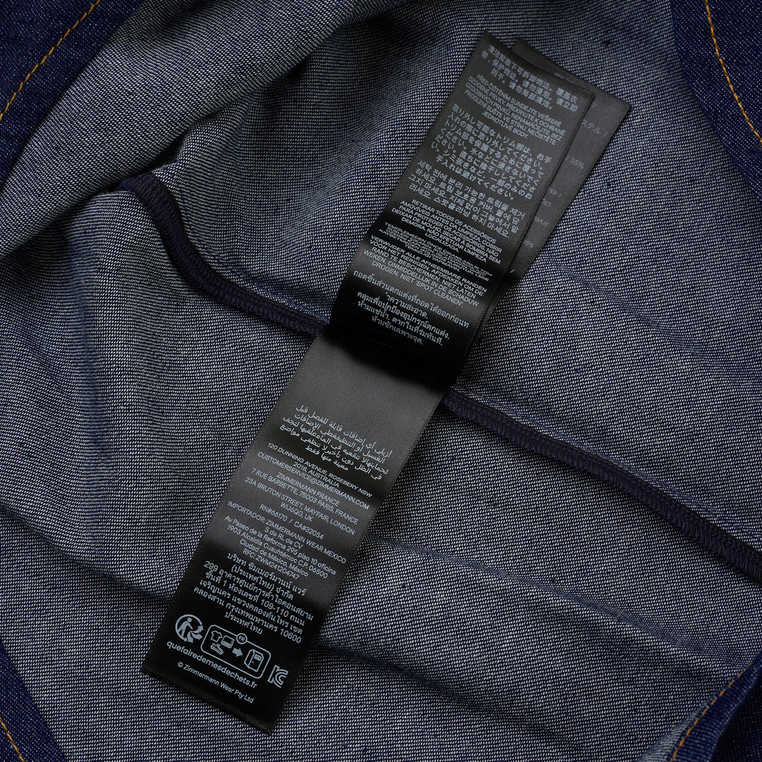 Zimmermann Denim Billow Shirt in dark indigo with stand collar, gold-tone buttons, contrast topstitching and balloon sleeves - view 5