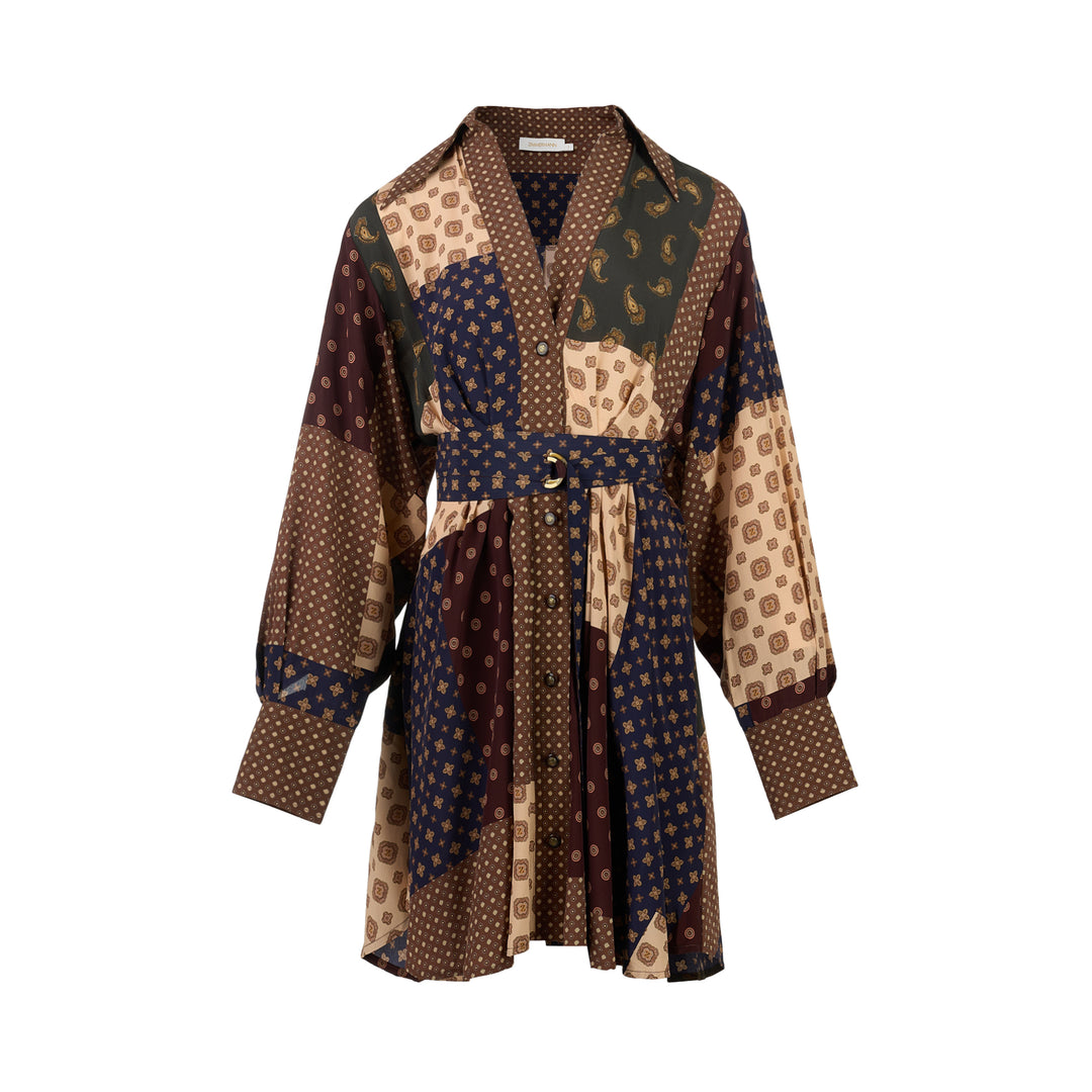 Zimmermann Tuck Mini Dress in brown, navy, cream and olive patchwork print with paisley and medallion motifs, V-neck collar, button front, long sleeves and belted waist