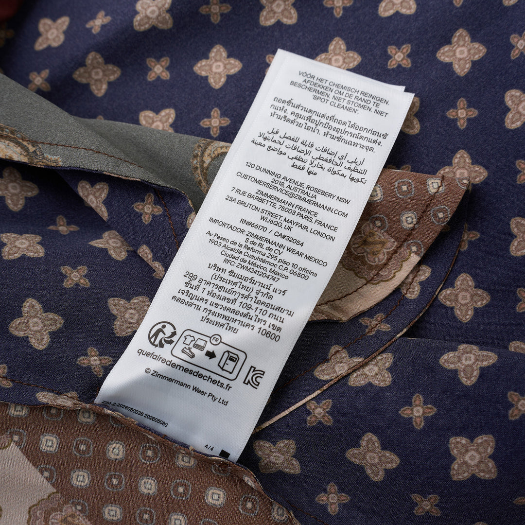 Zimmermann Tuck Mini Dress in brown, navy, cream and olive patchwork print with paisley and medallion motifs, V-neck collar, button front, long sleeves and belted waist - view 5