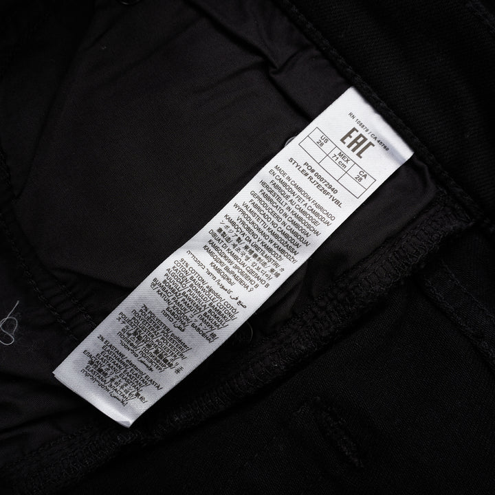 rag & bone Flexi Wren mid-rise full slim jeans in black stretch denim with five-pocket styling and rolled cuffs, shown from the front - view 3