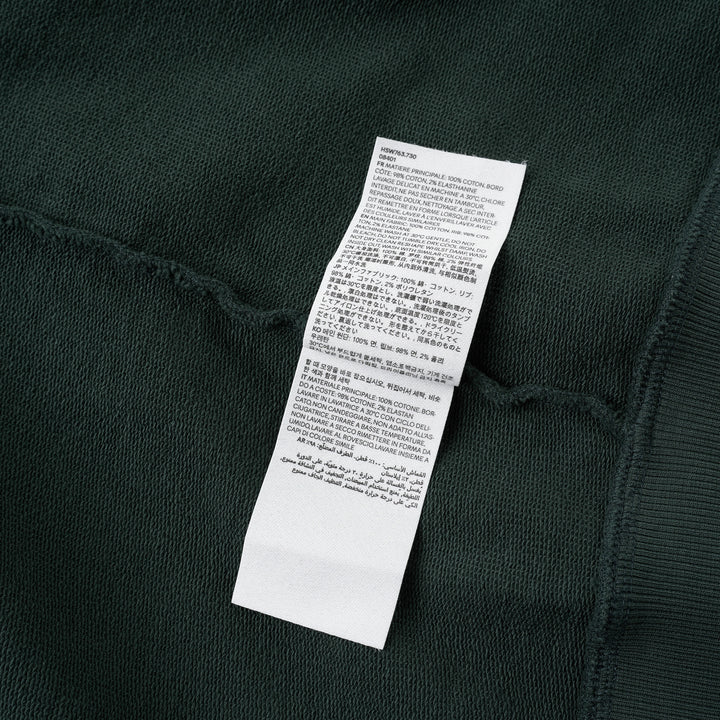AMI forest green crewneck sweatshirt with ribbed trim and a small embroidered Ami de Coeur logo at the chest - view 3