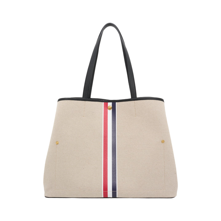 Thom Browne horizontal canvas tote bag with black leather handles, gold-tone studs and a red, white, and blue vertical stripe - view 3