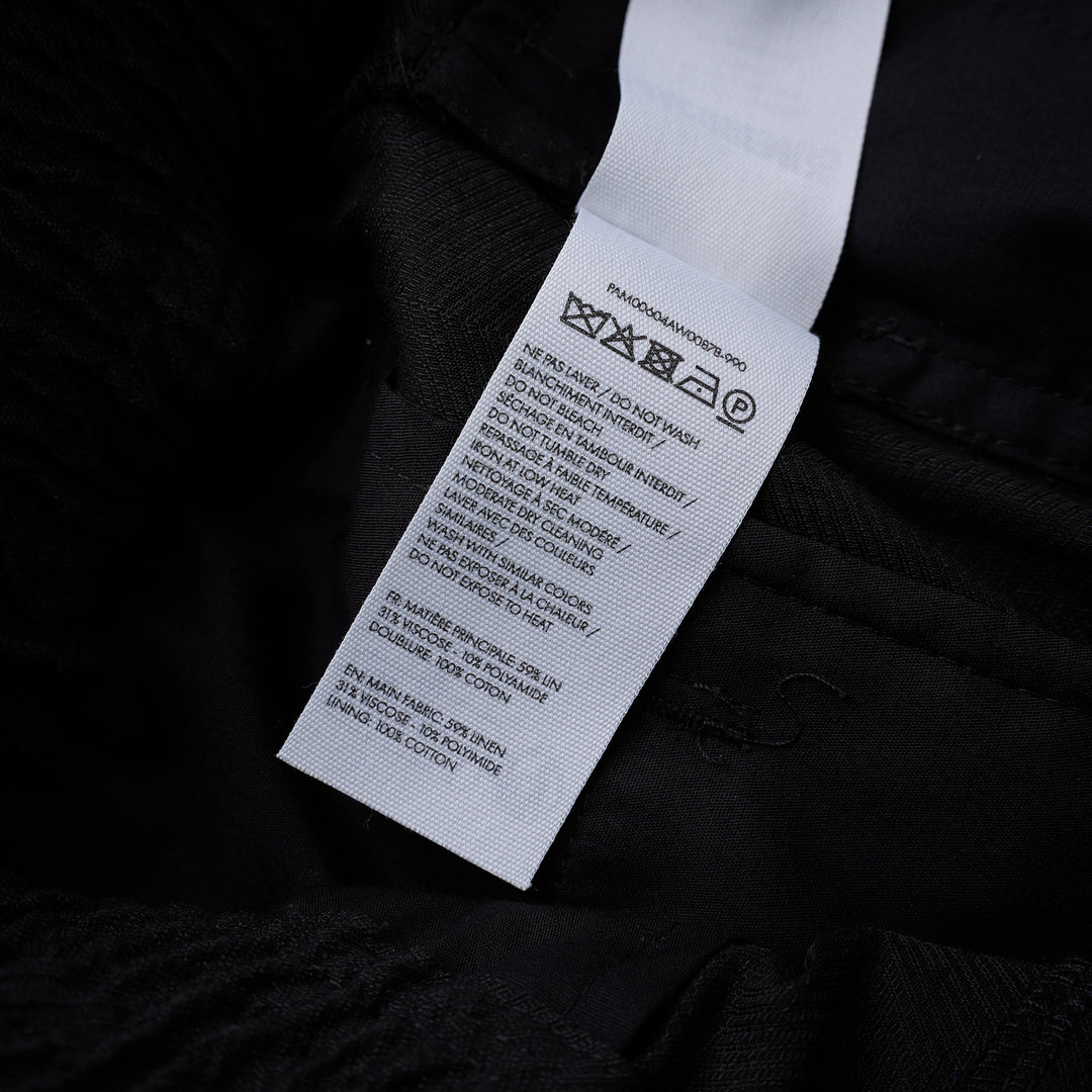 Jacquemus Miami black wide-leg trousers with a smocked elasticated waistband, shown from the front - view 3