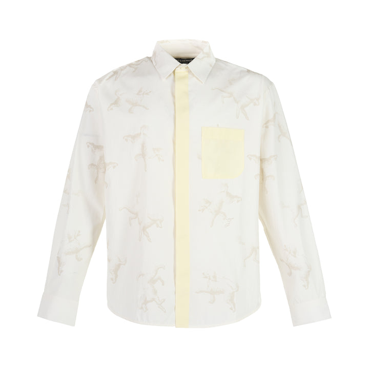 Jacquemus La Chemise Fefe white long sleeve shirt with tonal poodle print and pale yellow placket and chest pocket