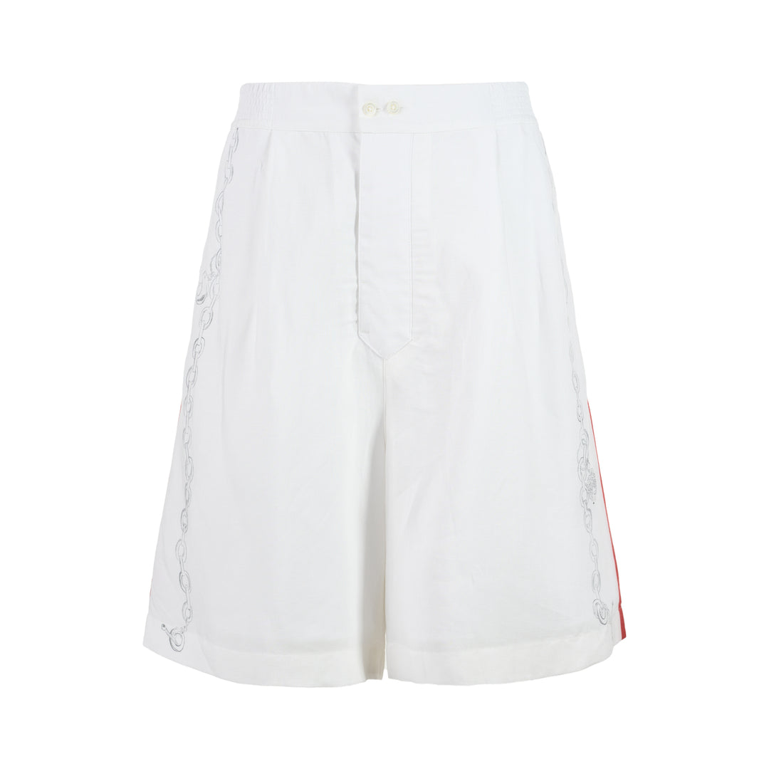 Jacquemus white pyjama shorts with sketched chain print down the legs, elasticated waistband and contrast red side stripe