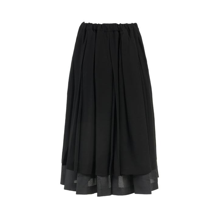Comme des Garçons black pleated midi skirt with elasticated waist and sheer layered hem