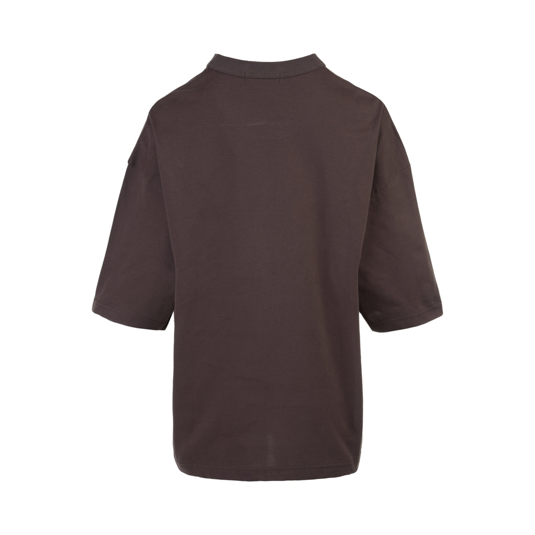 Comme des Garçons Homme Logo Tag Boxy Tee in dark brown with ribbed crewneck, dropped shoulders and wide short sleeves, shown flat from the front - view 2