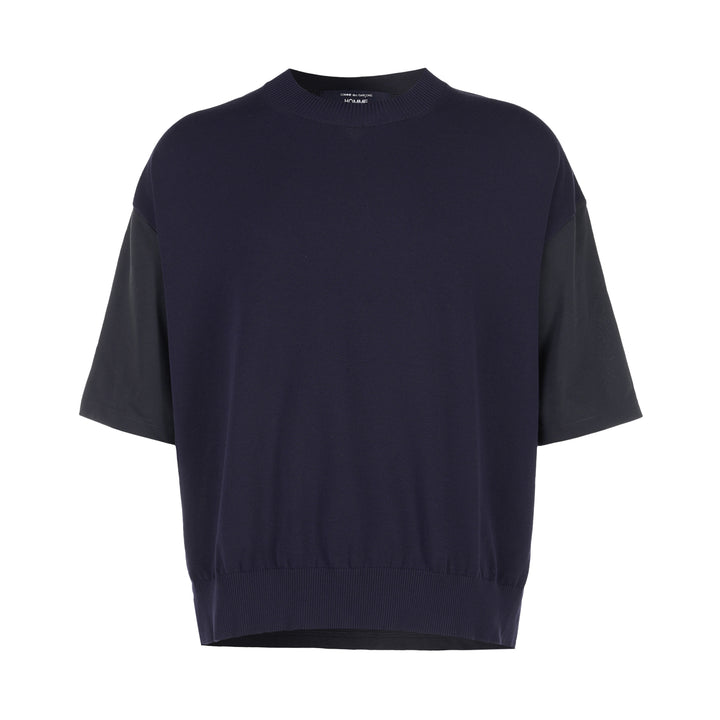 Comme des Garçons Homme navy fine-knit tee with contrasting black short sleeves, ribbed crew neck and hem, shown flat from the front