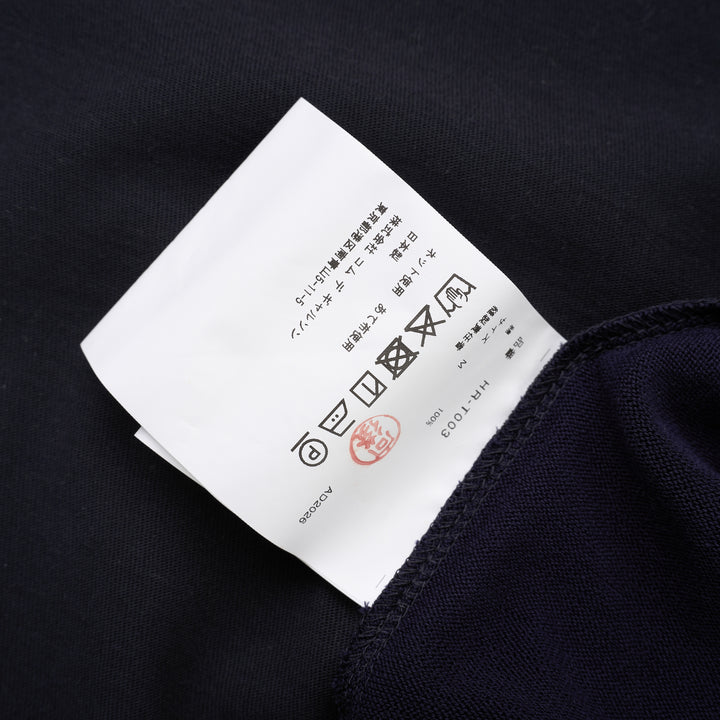 Comme des Garçons Homme navy fine-knit tee with contrasting black short sleeves, ribbed crew neck and hem, shown flat from the front - view 3