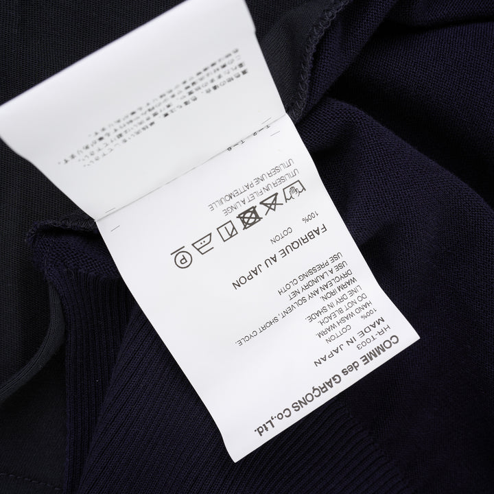 Comme des Garçons Homme navy fine-knit tee with contrasting black short sleeves, ribbed crew neck and hem, shown flat from the front - view 4