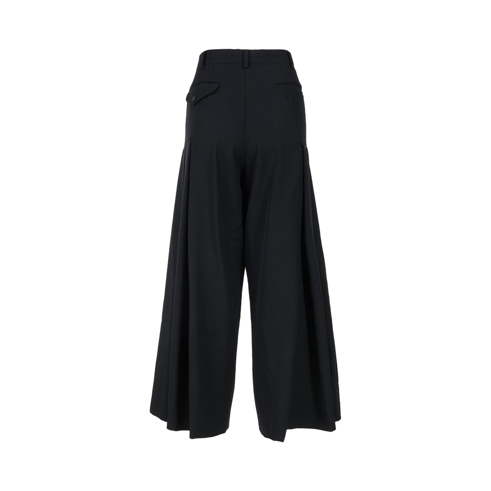 Black wool gabardine wide-leg pants with pleated skirt-like panels and high waist by Comme des Garçons Comme des Garçons - view 2