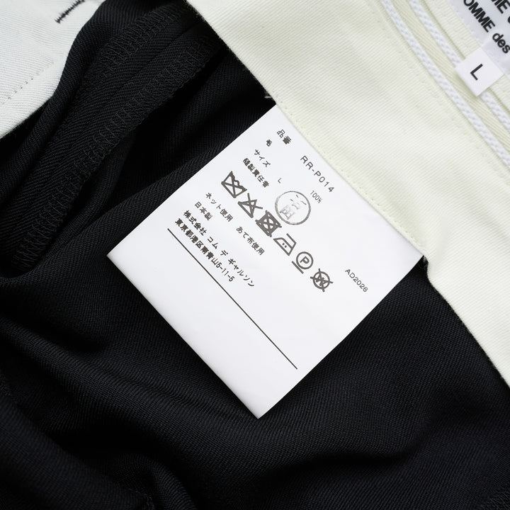 Black wool gabardine wide-leg pants with pleated skirt-like panels and high waist by Comme des Garçons Comme des Garçons - view 3